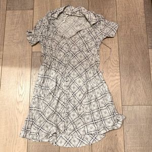 A cute Free People dress in a size 0.